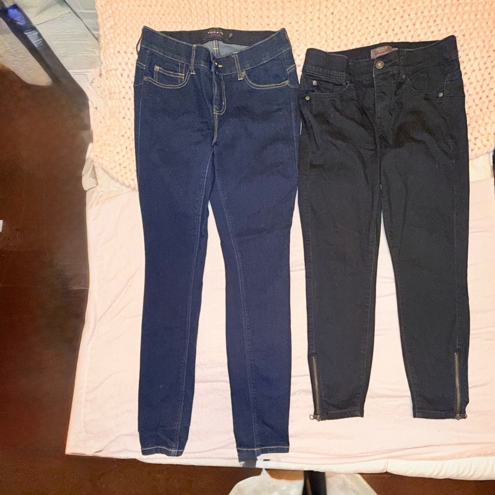 Torrid Women's Bombshell Skinny Jeans in Dark Blue and Black.